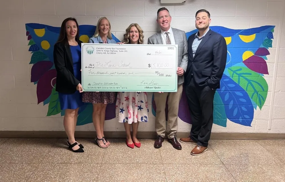 Deliver a check to Larc Shool for the Camdem County Bar Association annual fundraiser