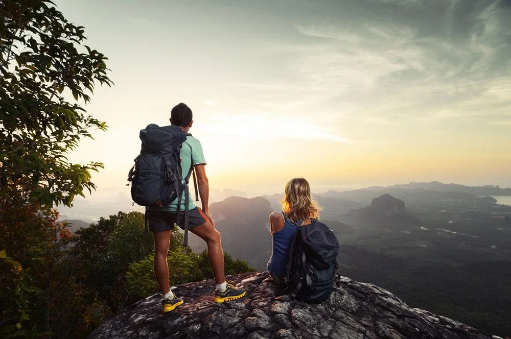 Couple hiking after their chiropractic adjustments.