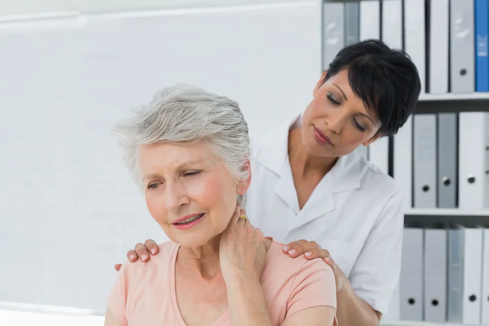 female_doctor_examining_senior_lady.jpg