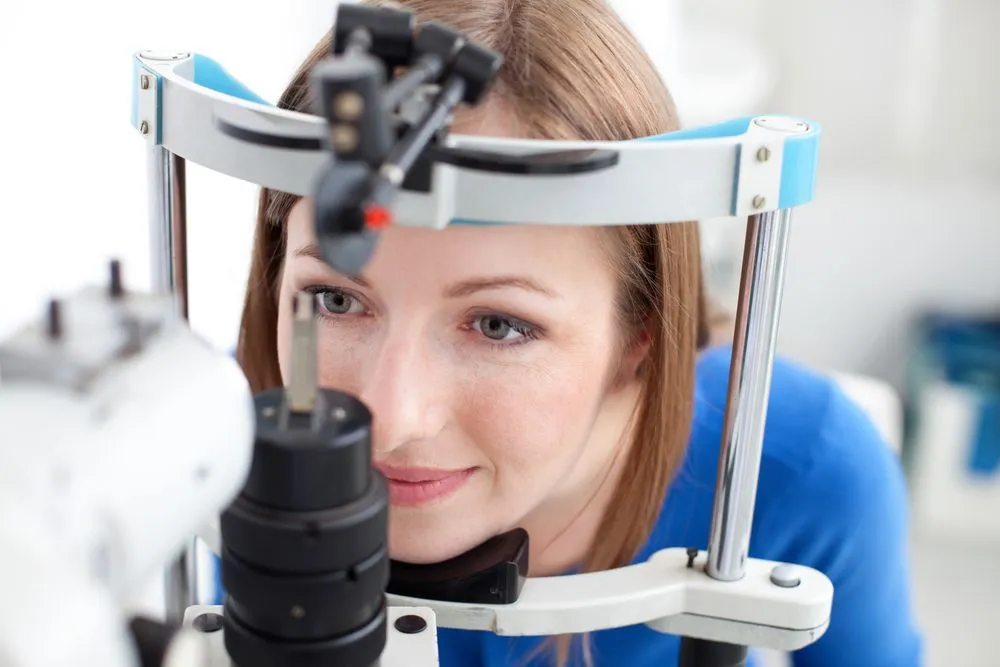 Woman getting an eye exam.