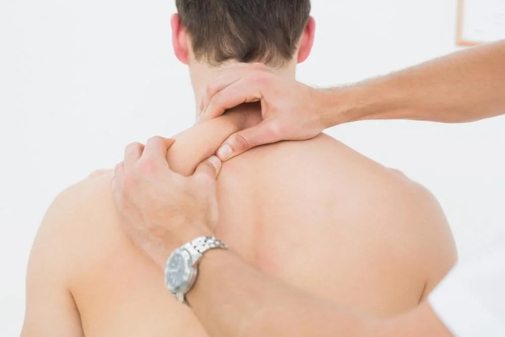 Man receiving shoulder pain relief in Fayetteville, NC