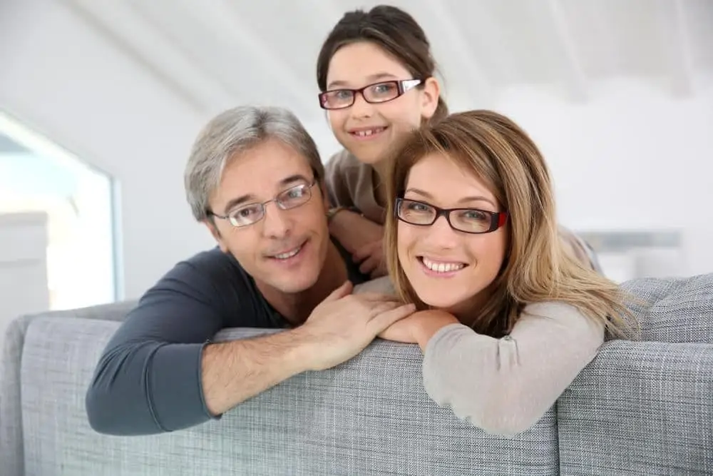Family enjoying their new glasses from their local eye doctor in Utica