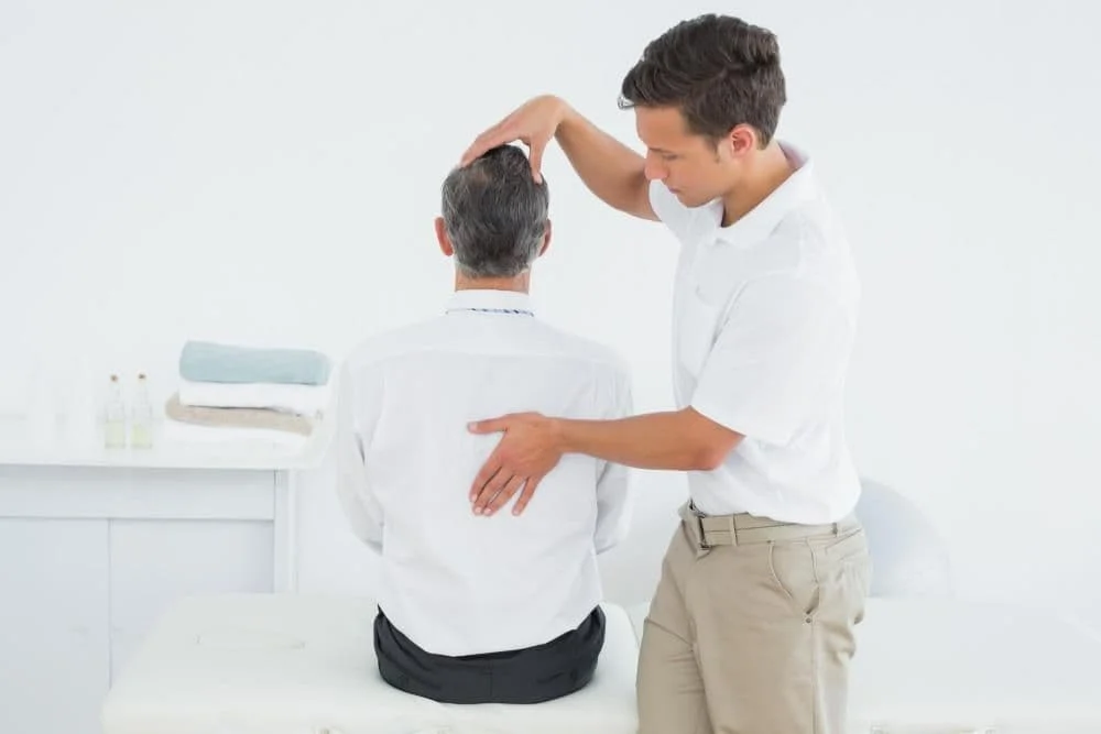 man receiving a chiropractic adjustment 