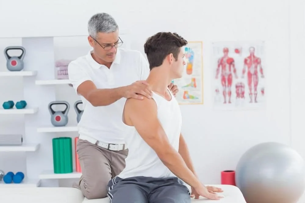 man giving chiropractic adjustment 