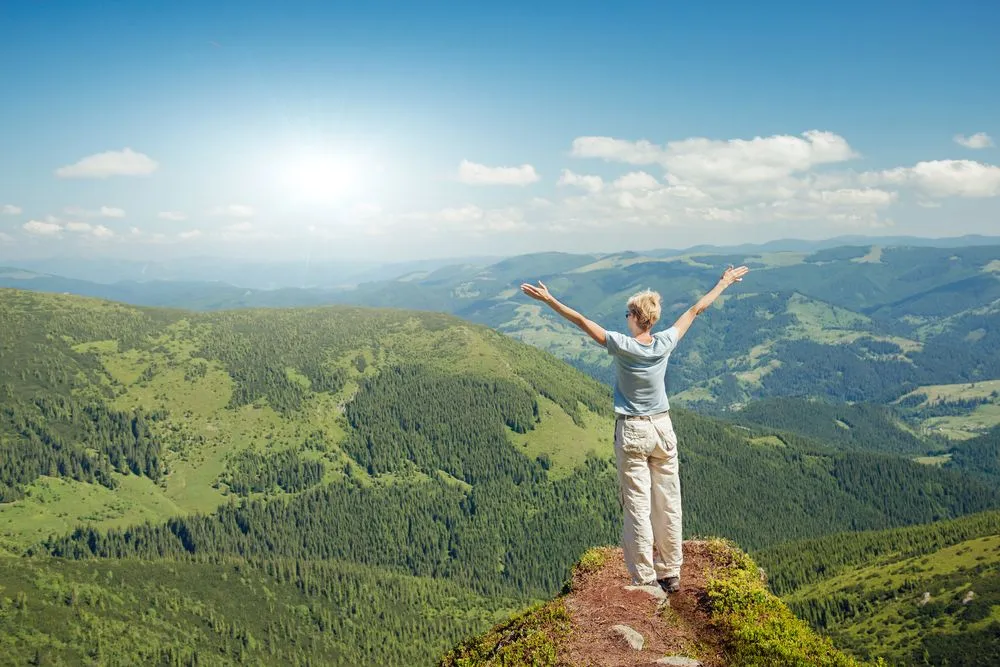 Woman overlooking mountain view