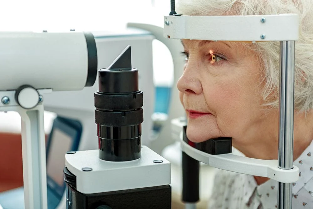 elderly woman getting eye exam for glaucoma