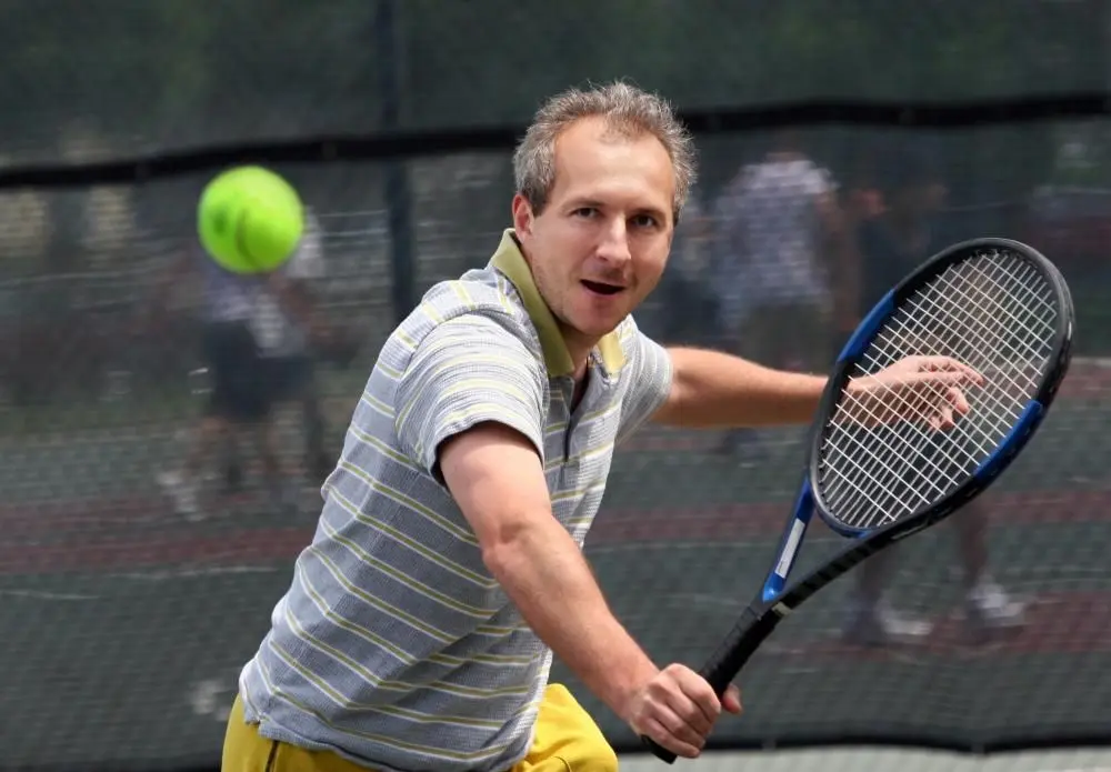 Man Playing Tennis in San Antonio, TX