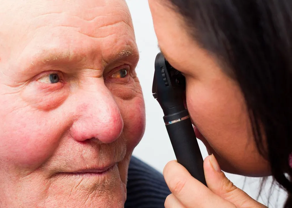 senior man getting diabetic eye exam