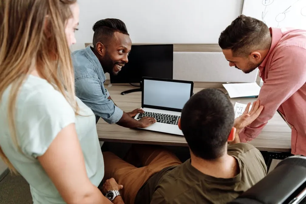 people collaborating in office