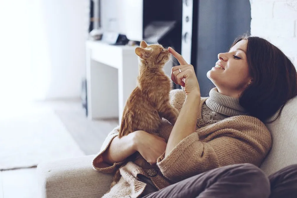 woman and a cat