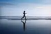 Woman jogging on a beach