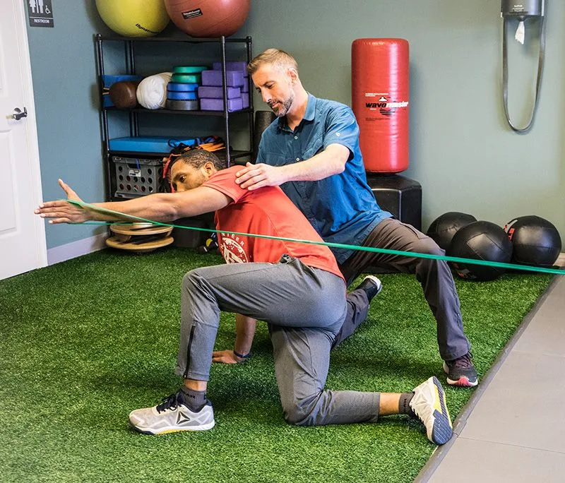 Dr. Sheehan assisting a patient