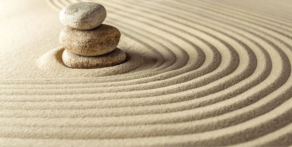 Tranquil Balancing Rocks in Sand