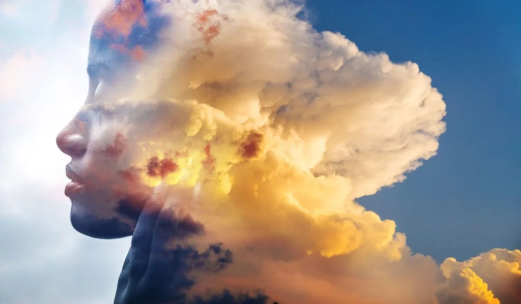 woman face in cloud