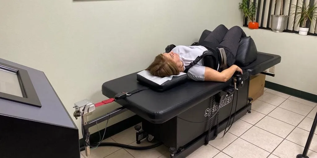 Patient undergoing Spinal Decompression using SpineMED Therapy