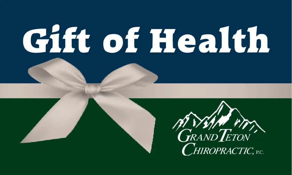 The text reads "Gift of Health." Beneath the text is a ribbon tied in a bow. Beneath the ribbon is the Grand Teton Chiropractic logo.