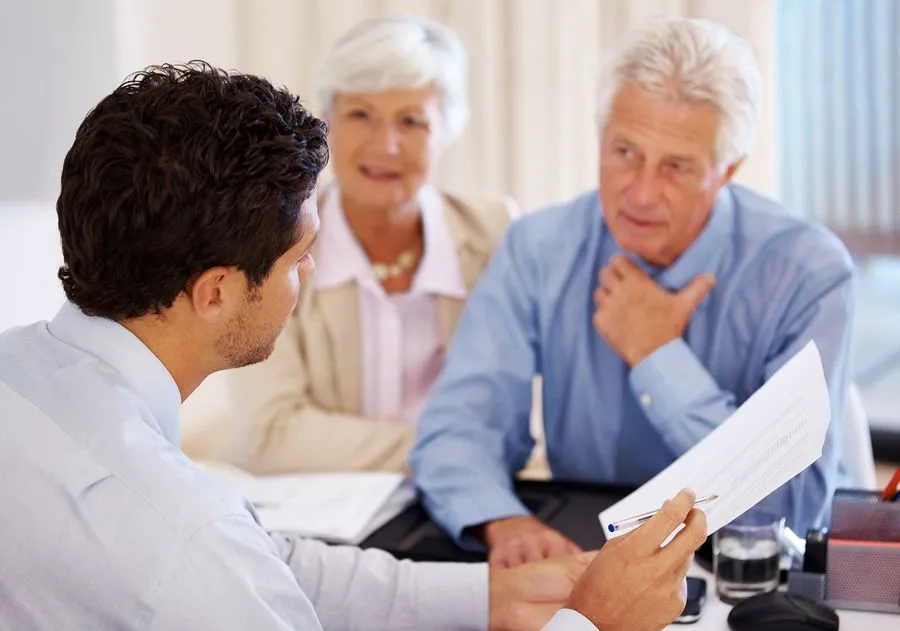 Couple consulting with a chiropractic doctor