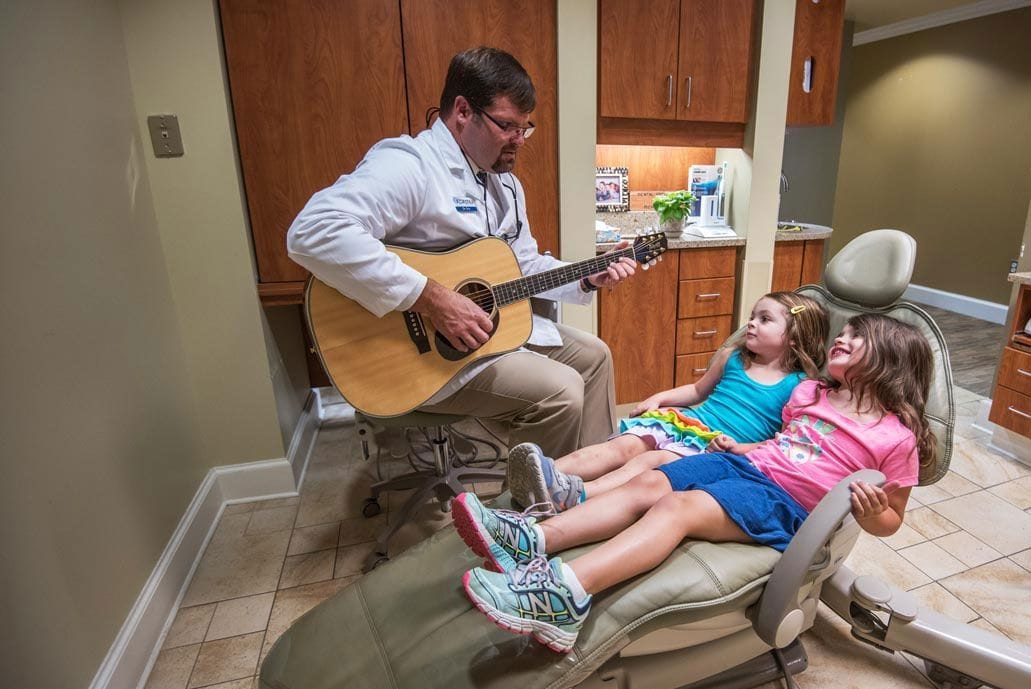 Topeka Dentist Dr. Eric Johnson with Patients