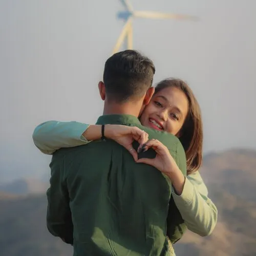 couple making heart with hands