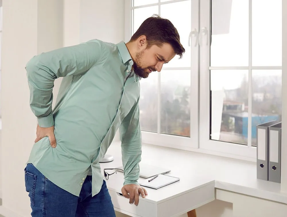 man with sciatica pain