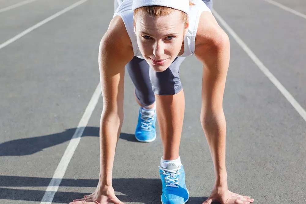 photo of a woman about to run