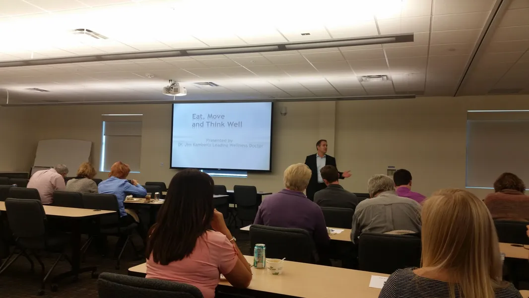 Dr Kambeitz speaking at a corporate wellness event