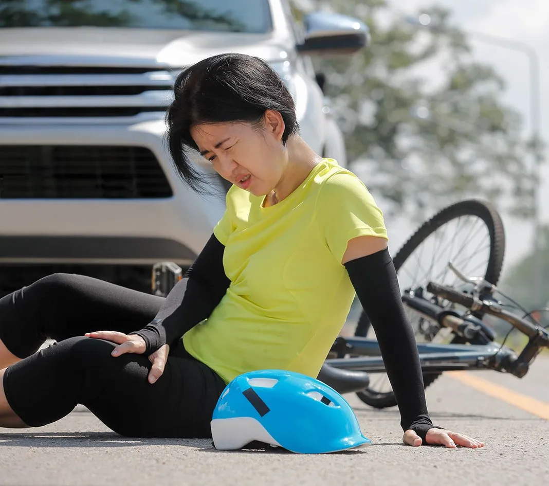 Woman and bike accident