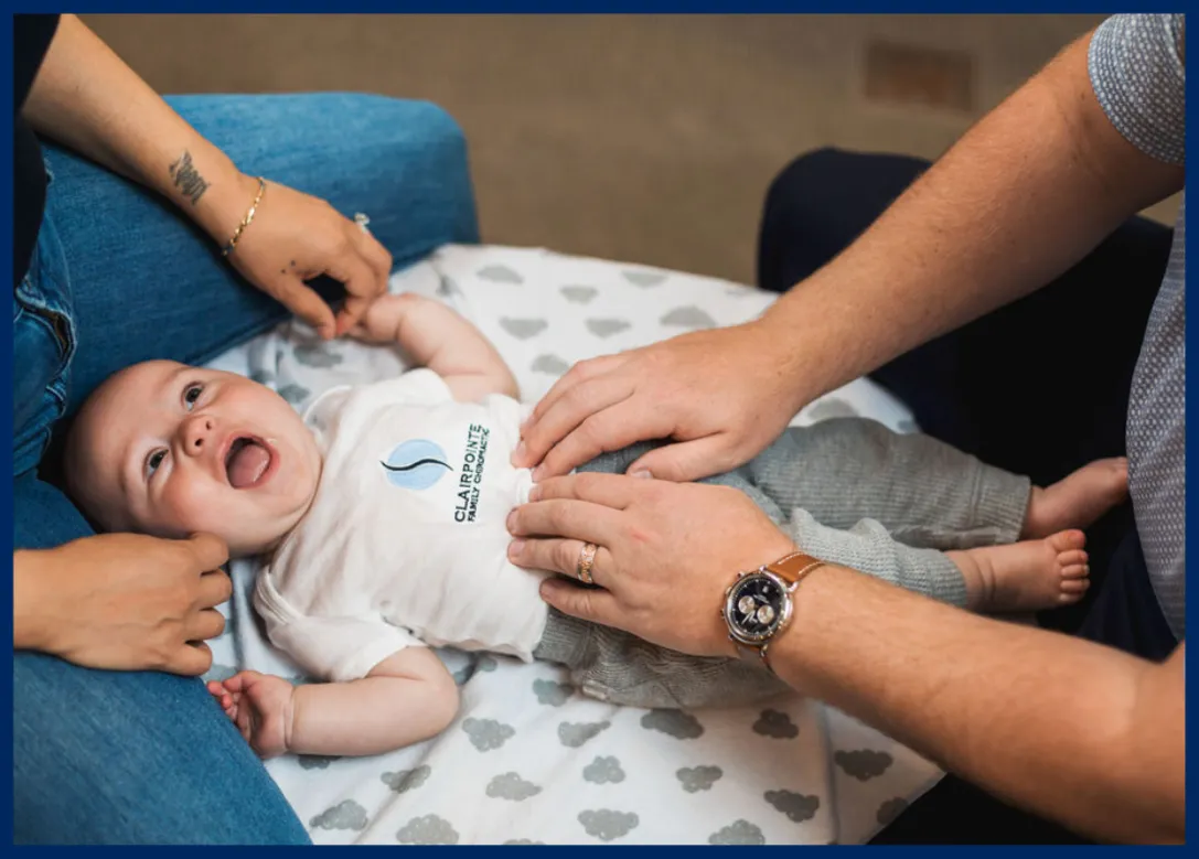 Clairpointe Baby Picture of infant getting adjusted.