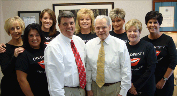 Dr. Lee Snelson DDS & Dr. Jim Snelson DDS in group photo with dental staff at Snelson and Snelson DDS, Dentist Warren OH