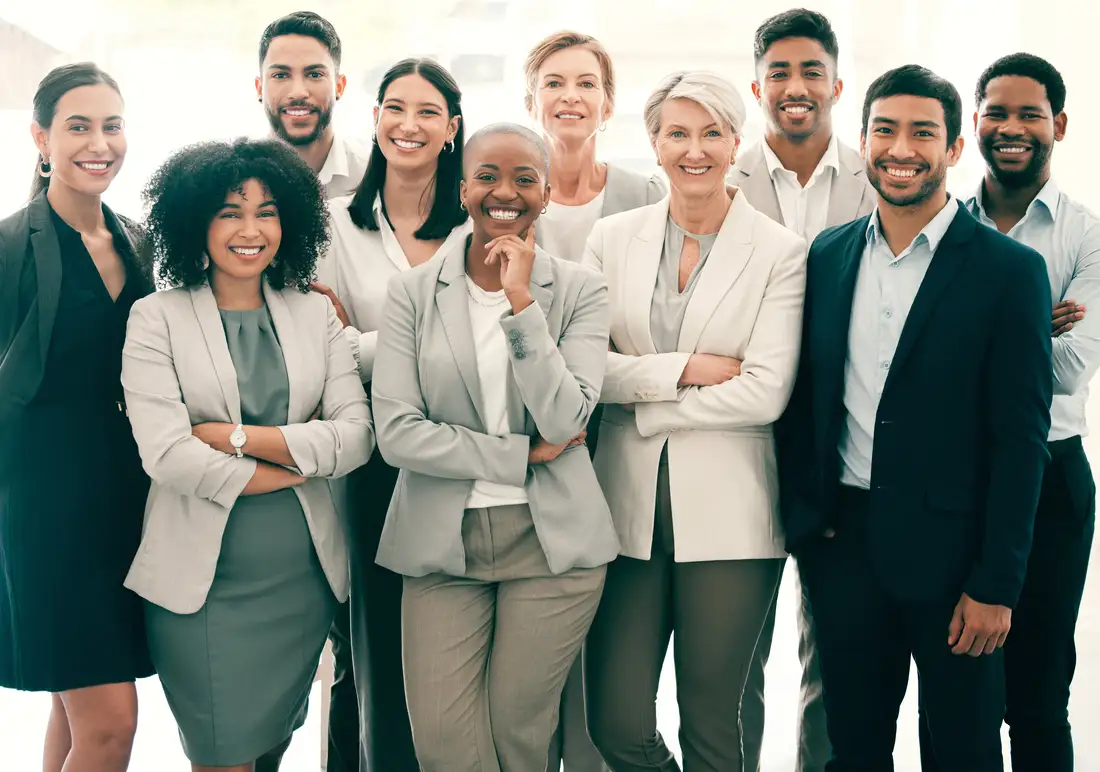 group of people standing and smiling