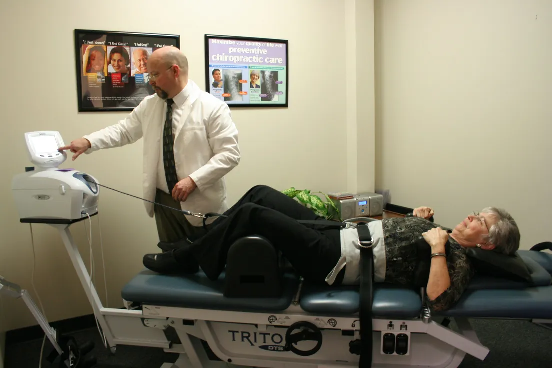 Doctor with patient getting spinal decompression