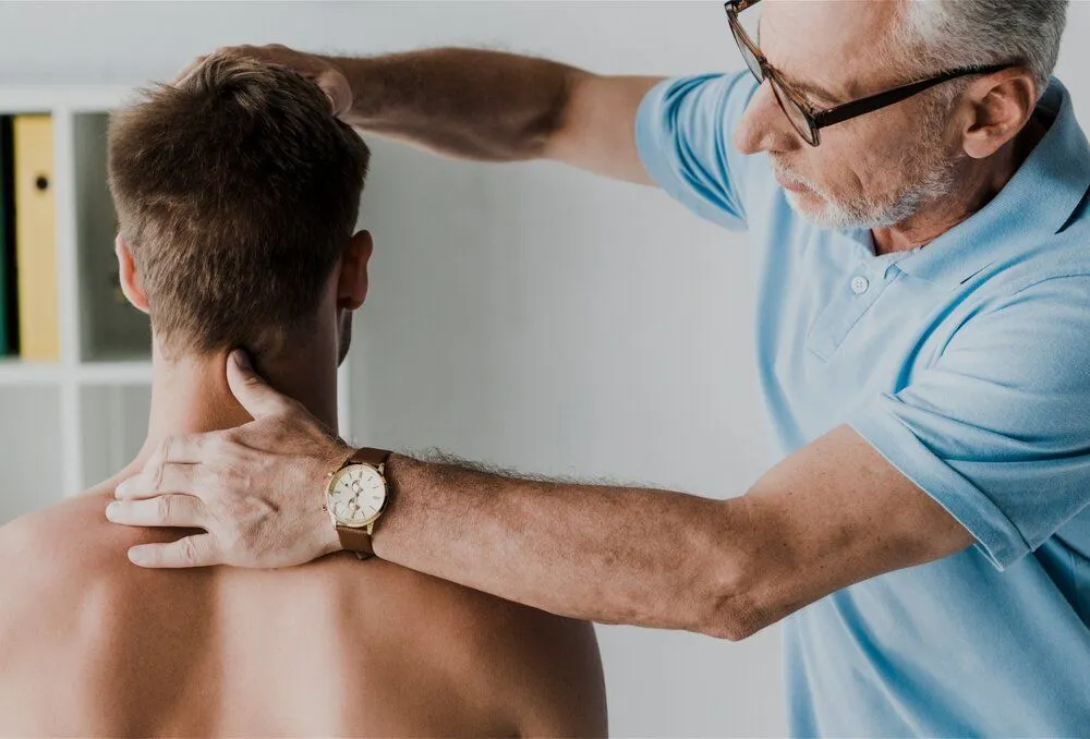 doctor treating a patient