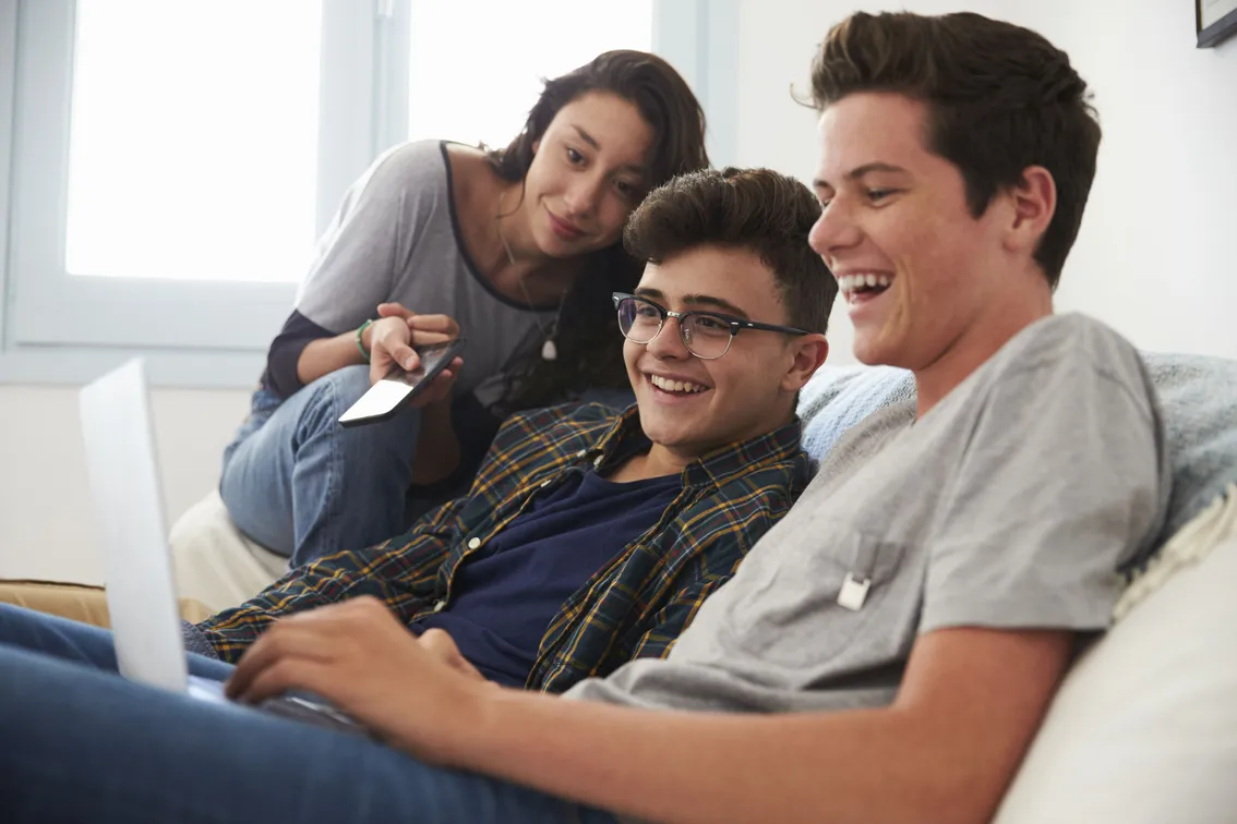 teens with laptop