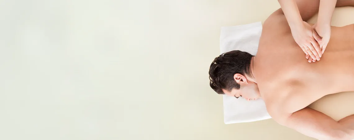 man receiving a back massage
