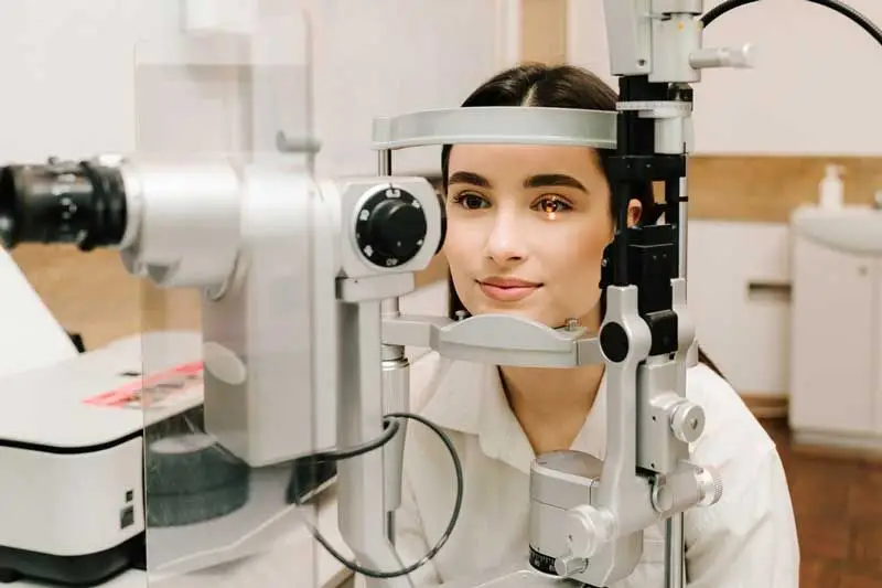 Woman getting an eye exam