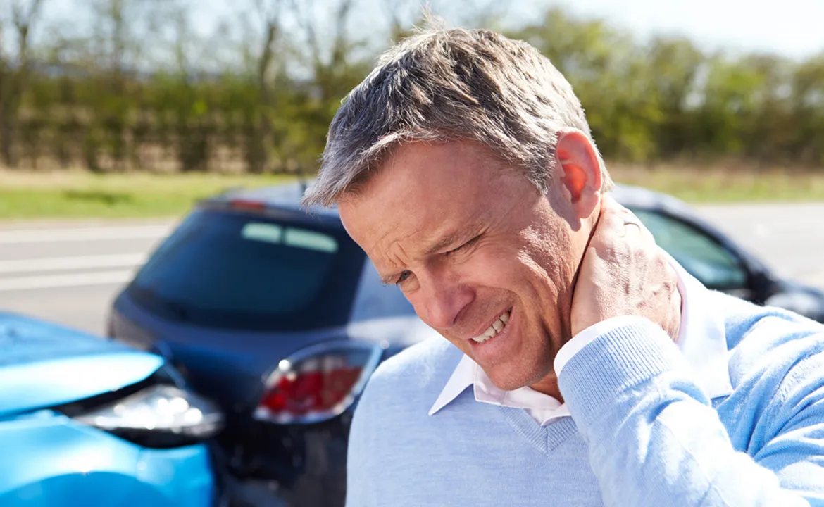 A man in need of auto accident chiropractic care in Tampa, FL