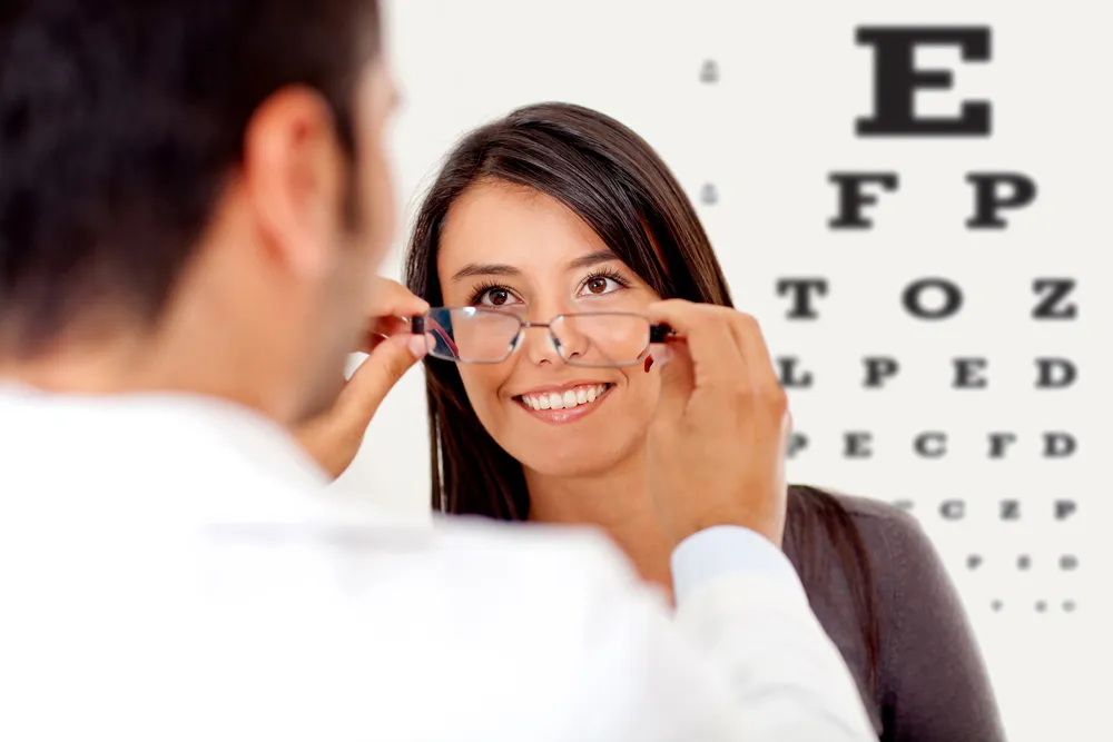 Optometrists with patient