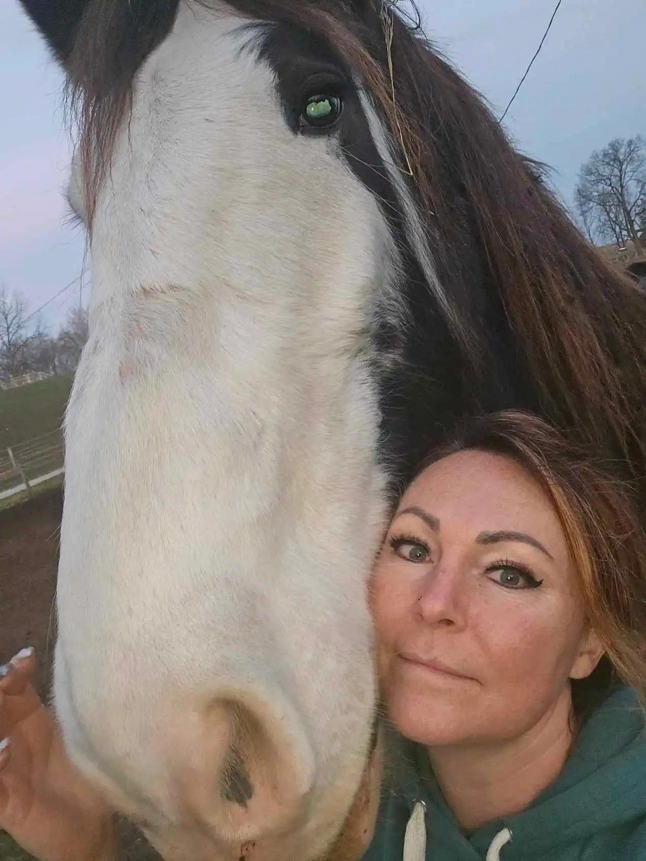 Dr. Tricia with one of her horses.