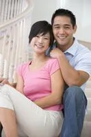 Couple smiling in staircase