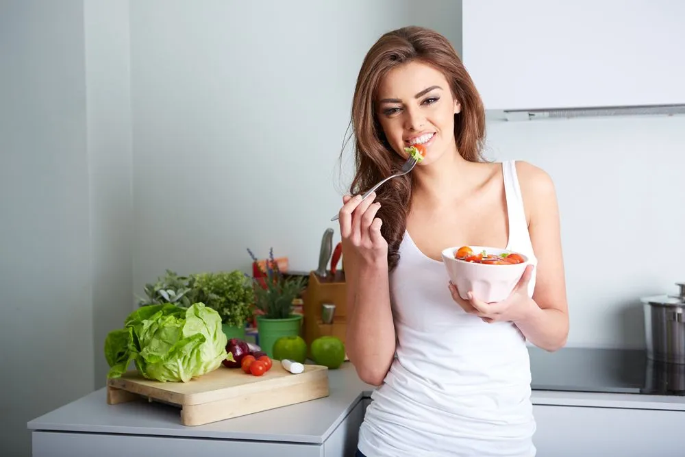 Woman eating a salad