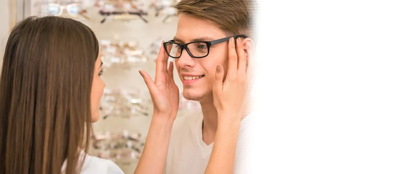 Woman putting man s eyeglasses