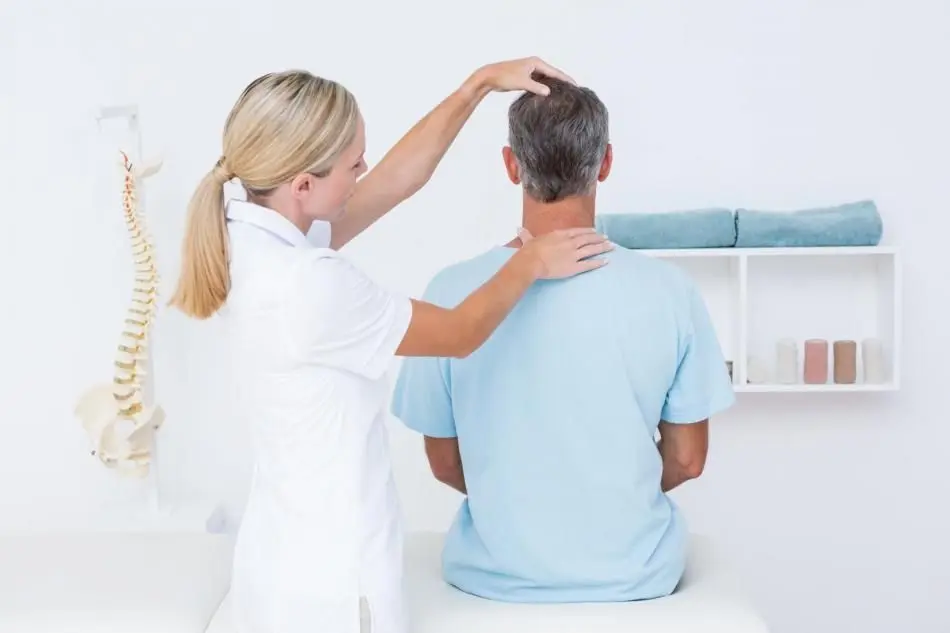 Chiropractor in West Hartford Chiropractic adjusting a patient's spine 