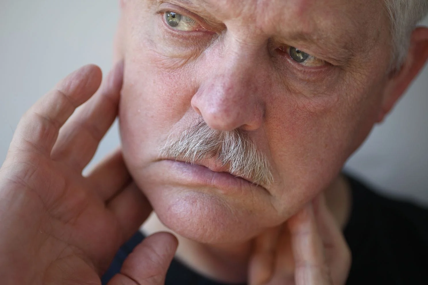 man suffering from TMJ in West Babylon, NY