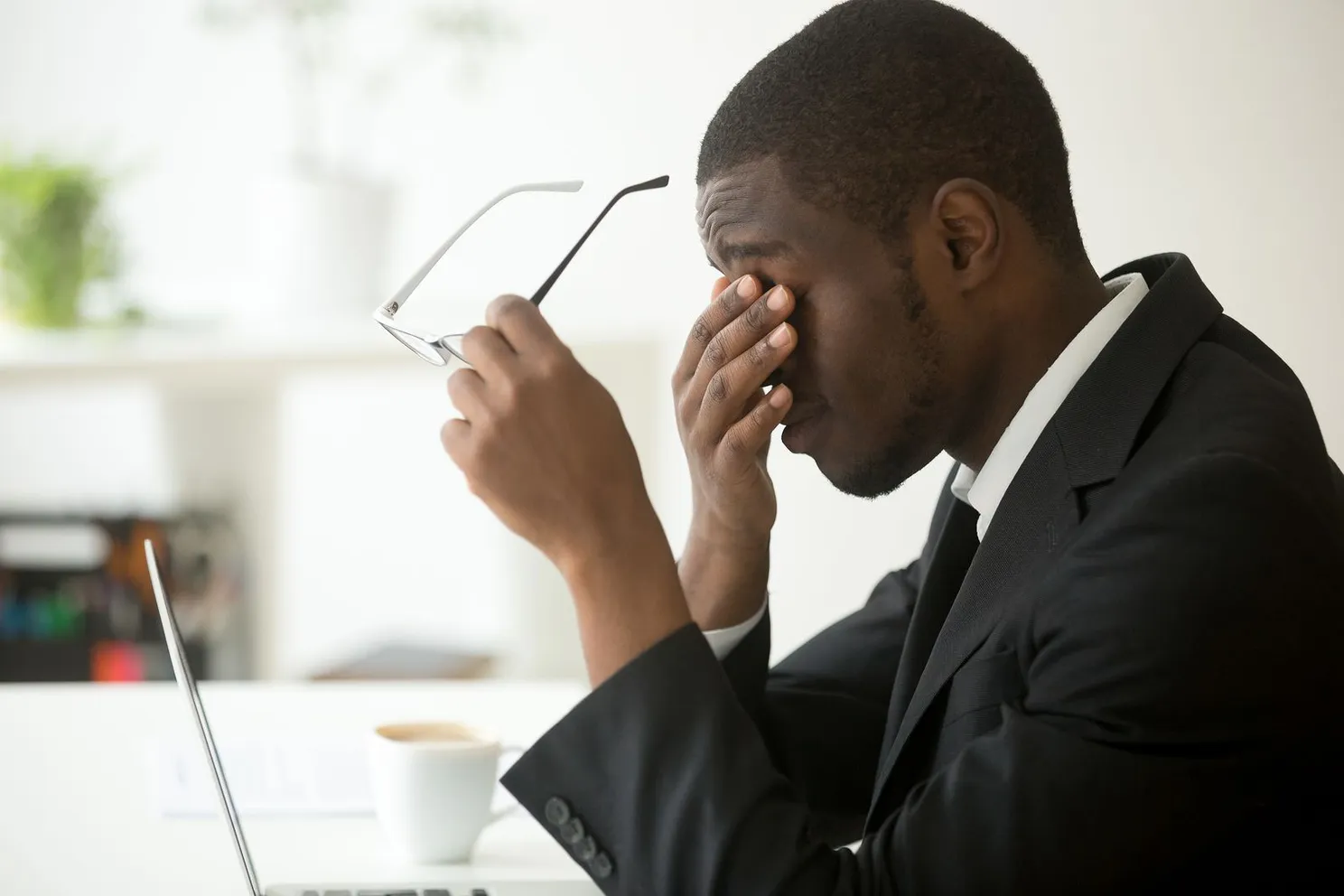 man suffering from dry eye