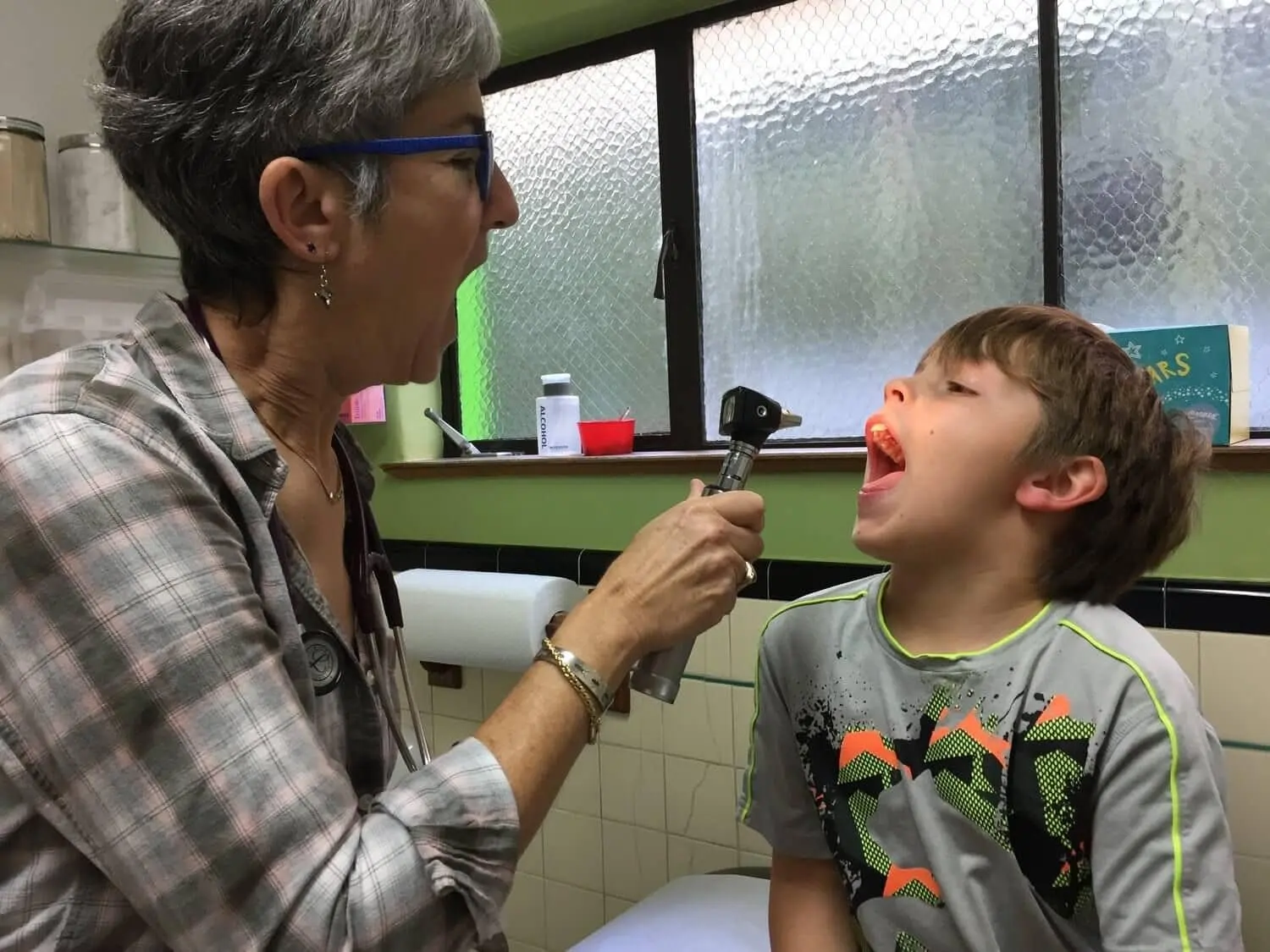 Dr. Robin checks the teeth of her patient