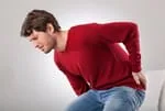 Man with Back Pain in Sugar Land