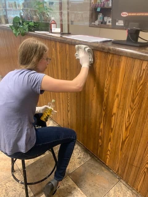 woman painting counter