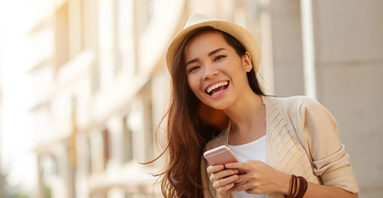 Woman smiling on phone