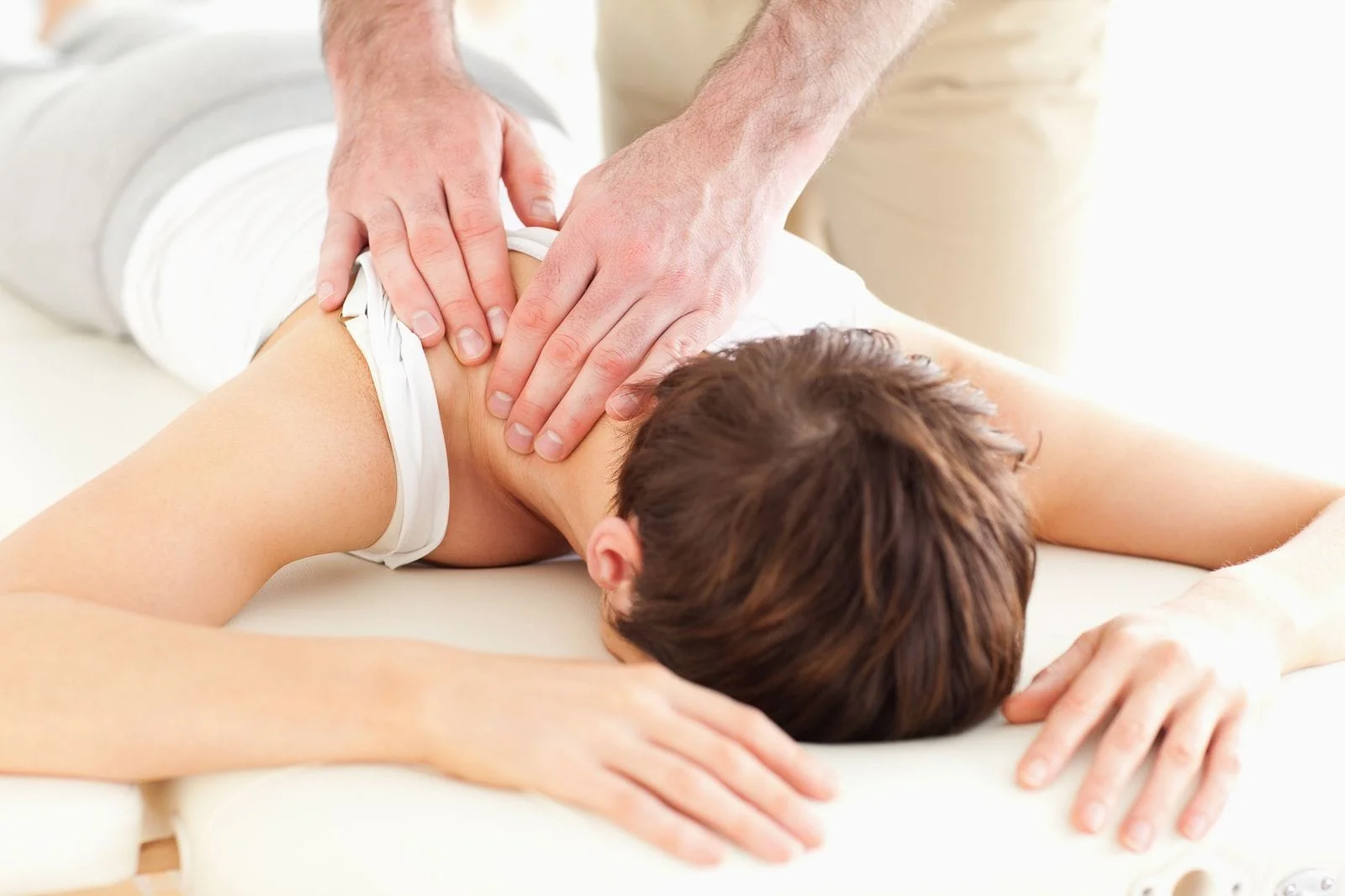 woman receiving massage at corporate massage event with Bangor Chiropractor