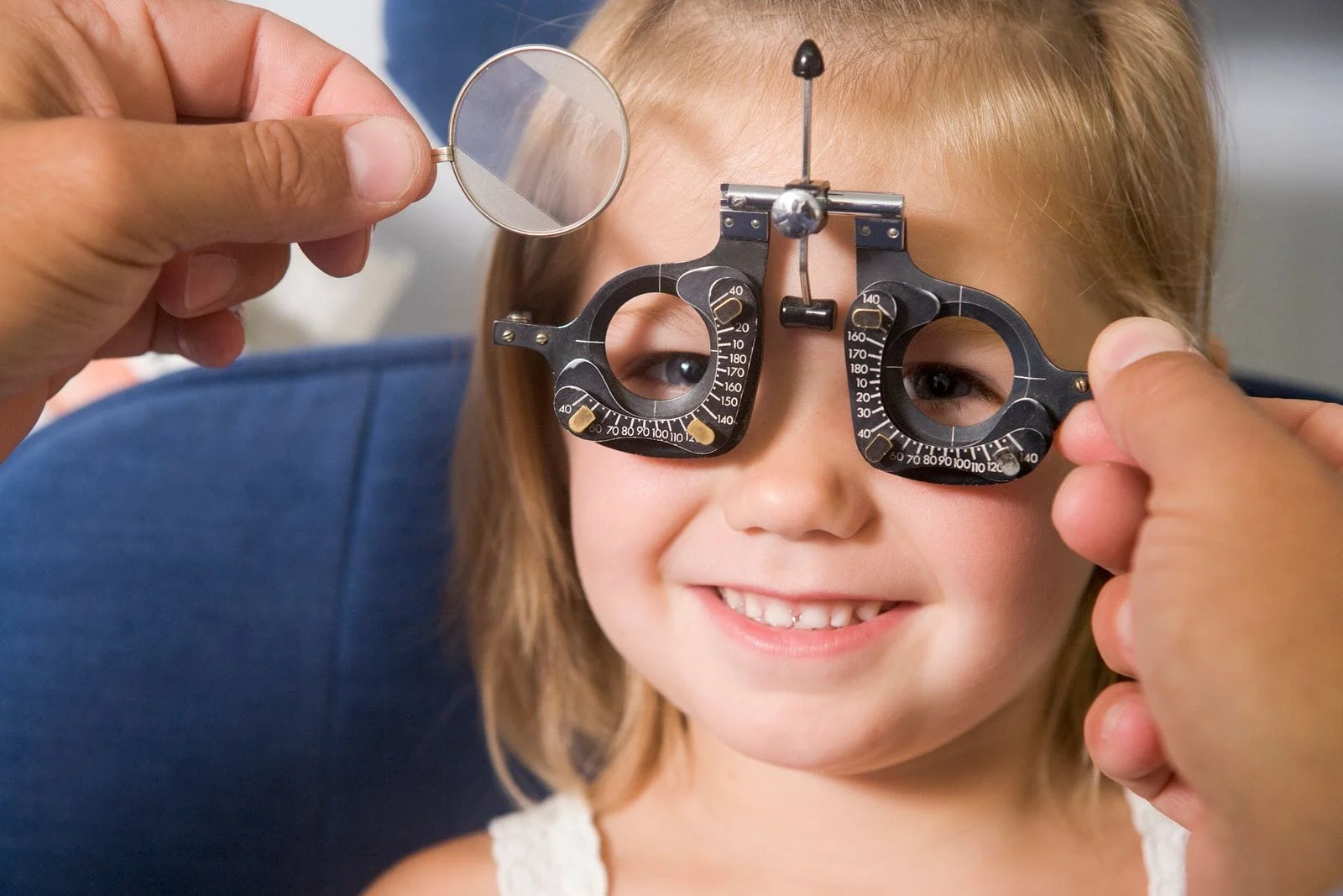 child getting eye examined